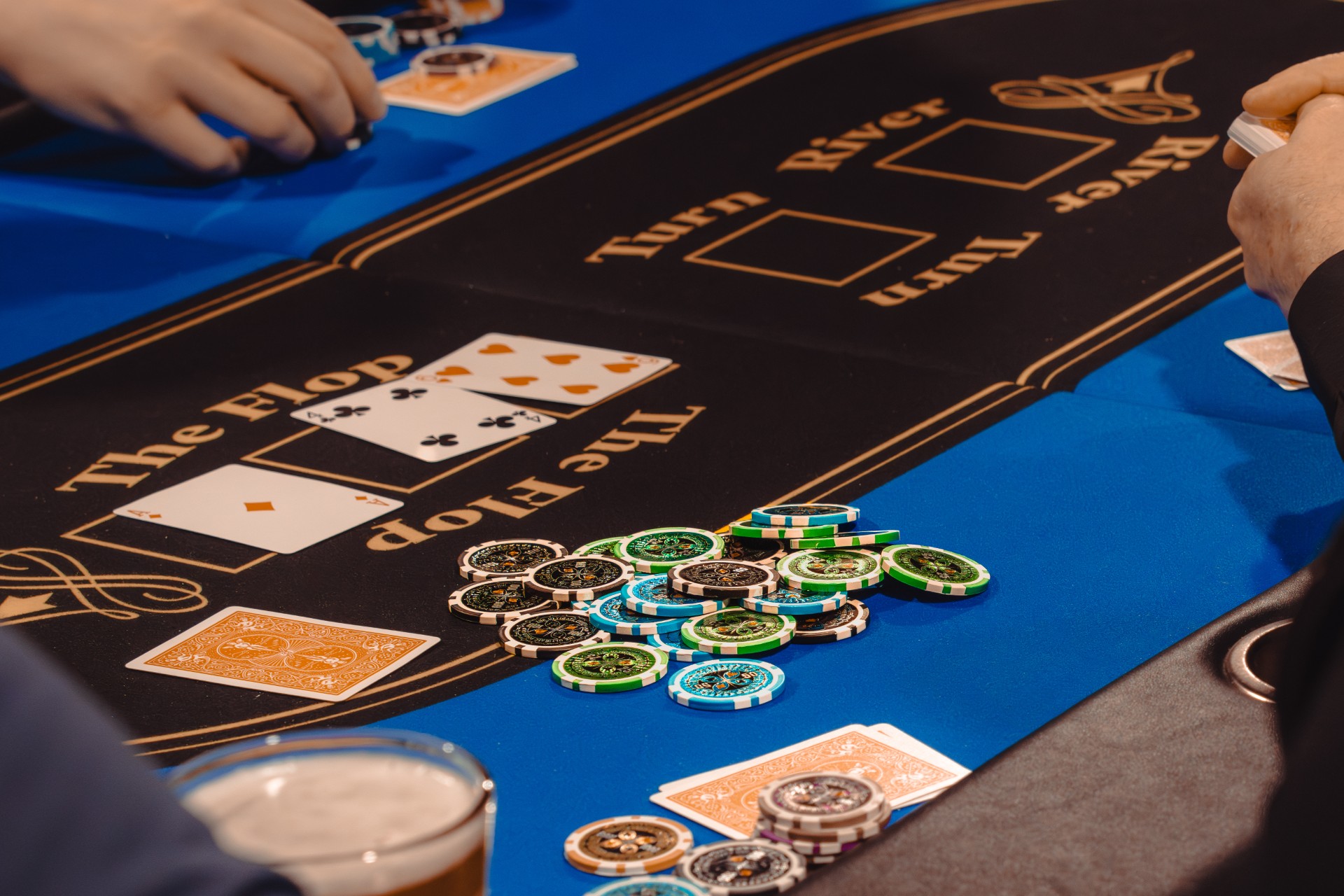 Texas Hold'em table with chips and cards at a Double Down poker event
